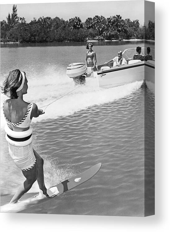 young-woman-slalom-water-skis-underwood-archives-canvas-print