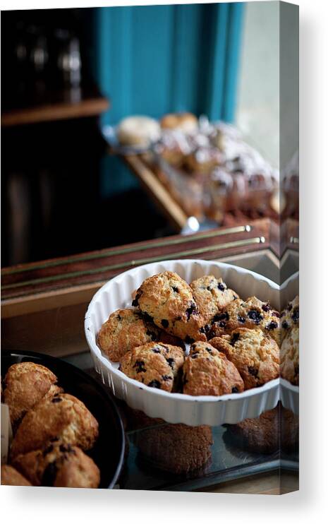 Breakfast Canvas Print featuring the photograph A Variety Of Scones For Sale On Display #1 by Halfdark