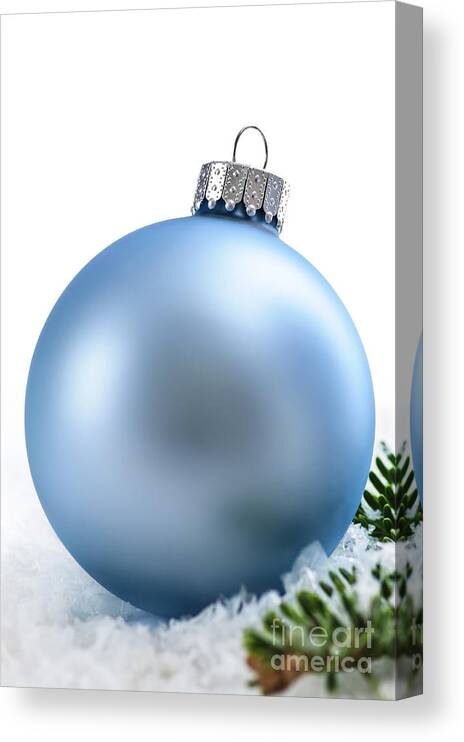 Christmas Canvas Print featuring the photograph Blue Christmas bauble 1 by Elena Elisseeva