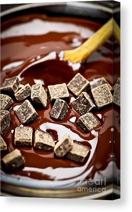Chocolate Canvas Print featuring the photograph Melting chocolate #1 by Elena Elisseeva