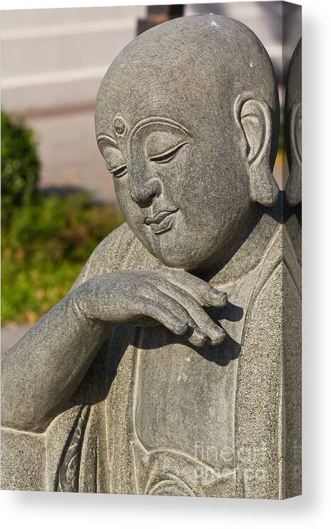 Architecture Canvas Print featuring the photograph Smile buddha face #1 by Tosporn Preede