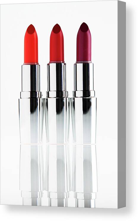 White Background Canvas Print featuring the photograph Still Life Of Lipsticks #1 by Stephen Smith