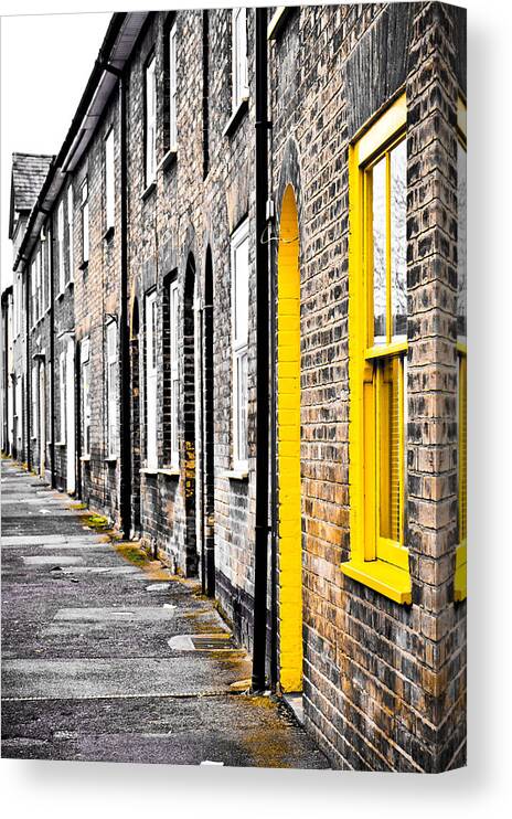 19th Canvas Print featuring the photograph Yellow door #1 by Tom Gowanlock