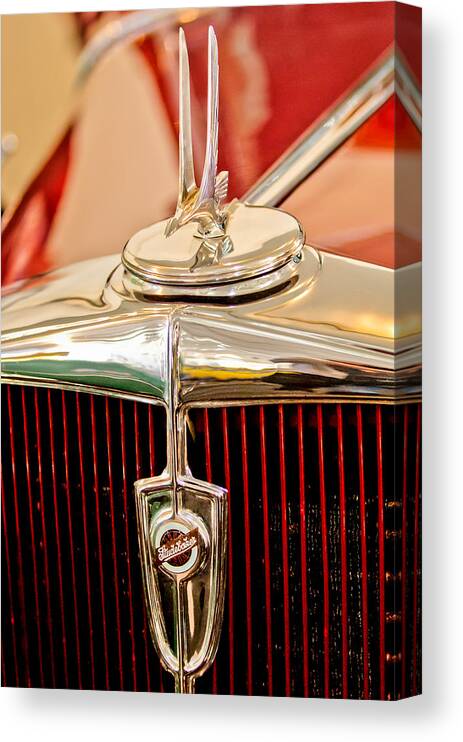 1932 Studebaker Dictator Custom Coupe Hood Ornament Canvas Print featuring the photograph 1932 Studebaker Dictator Custom Coupe Hood Ornament - Emblem by Jill Reger