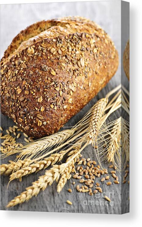 Bread Canvas Print featuring the photograph Loaf of multigrain bread 2 by Elena Elisseeva
