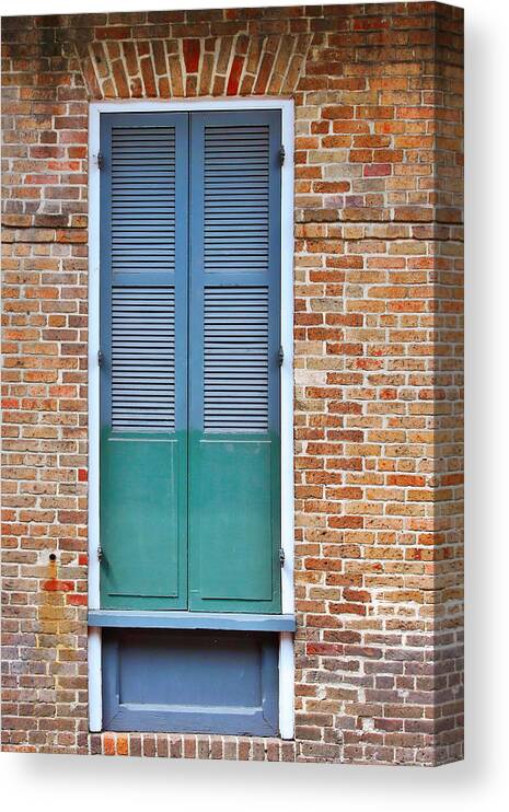 Front Canvas Print featuring the photograph A Blue Door in New Orleans by Alexandra Till