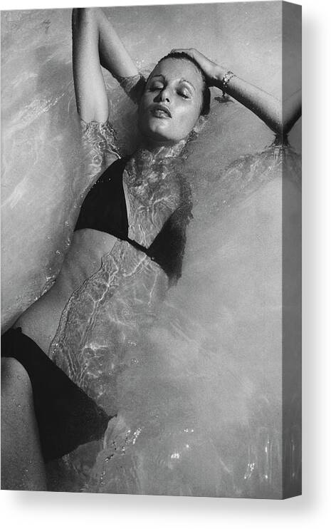 Fashion Canvas Print featuring the photograph Apollonia Van Ravenstein Wearing A Catalina by Bob Stone
