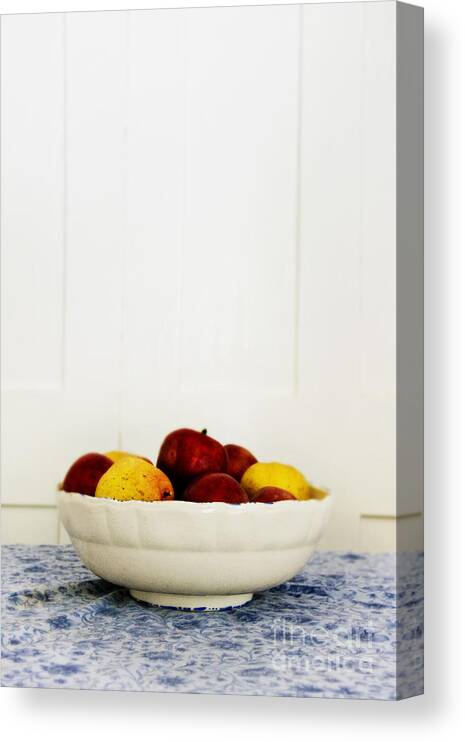 Fruit; Bowl; Still Life; Table; Table Cloth; Bowl Of Fruit; Fresh; Food; Kitchen; Old; Apples; Red; Yellow; Inside; Indoors; White; Blue; Minimal; Minimalism; Wall; Wood Canvas Print featuring the photograph Apples by Margie Hurwich