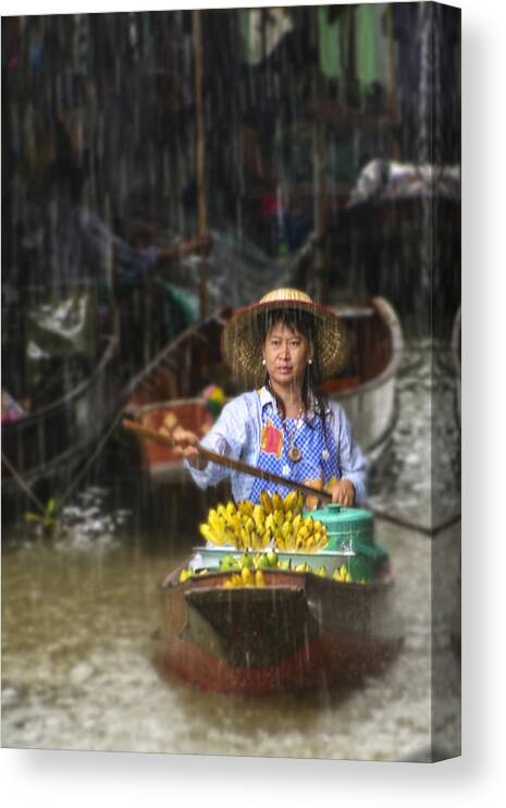 demnoen Saduak Canvas Print featuring the photograph Banana Vendor in the Rain by Rob Tullis