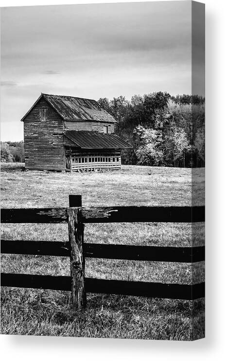B&w Canvas Print featuring the photograph Barn and old fence by Mark Summerfield