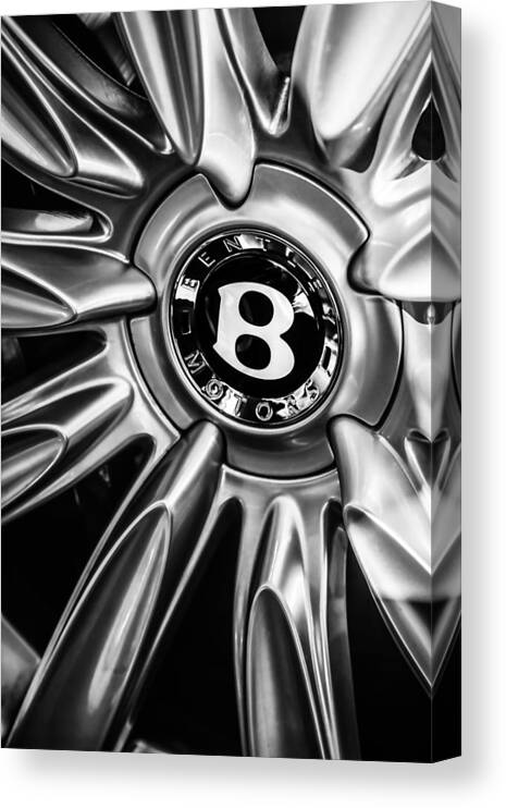 Bentley Wheel Emblem Canvas Print featuring the photograph Bentley Wheel Emblem -0303bw by Jill Reger