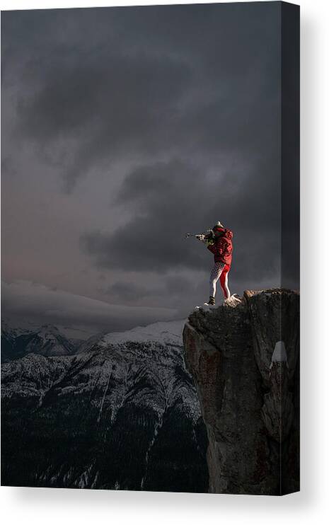 People Canvas Print featuring the photograph Biathelete Aims Firearm On Snowy by Ascent Xmedia