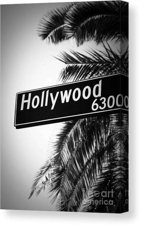 America Canvas Print featuring the photograph Black and White Hollywood Street Sign by Paul Velgos