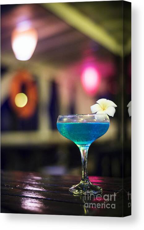 Cocktail Canvas Print featuring the photograph Blue Cocktail Drink In Dark Bar Interior by JM Travel Photography