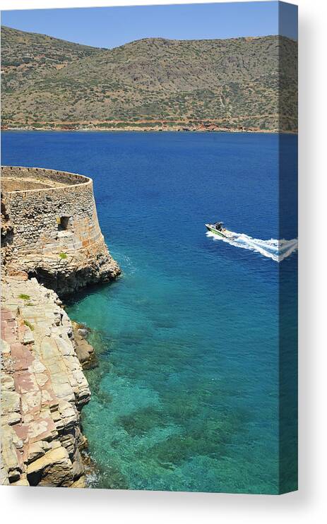Ocean Canvas Print featuring the photograph Blue water and boat - Spinalonga Island Crete Greece by Matthias Hauser