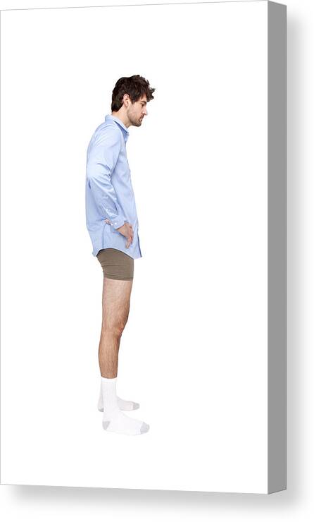 People Canvas Print featuring the photograph Caucasian businessman wearing shirt, socks and underwear by Kyle Monk