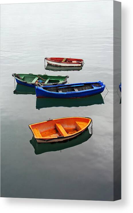 Fishing Canvas Print featuring the photograph colorful boats on Santurtzi by Mikel Martinez de Osaba