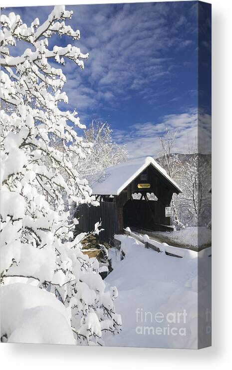 Emily's Bridge Canvas Print featuring the photograph Covered bridged blanketed in fresh snow. by Don Landwehrle