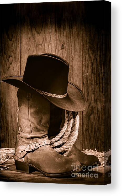 Boots Canvas Print featuring the photograph Cowboy Hat and Boots by Olivier Le Queinec