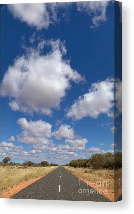 00477471 Canvas Print featuring the photograph Clouds And Desert Road by Yva Momatiuk John Eastcott