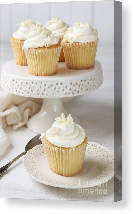 Vanilla Canvas Print featuring the photograph Cupcakes decorated with icing and white chocolate by Sandra Cunningham