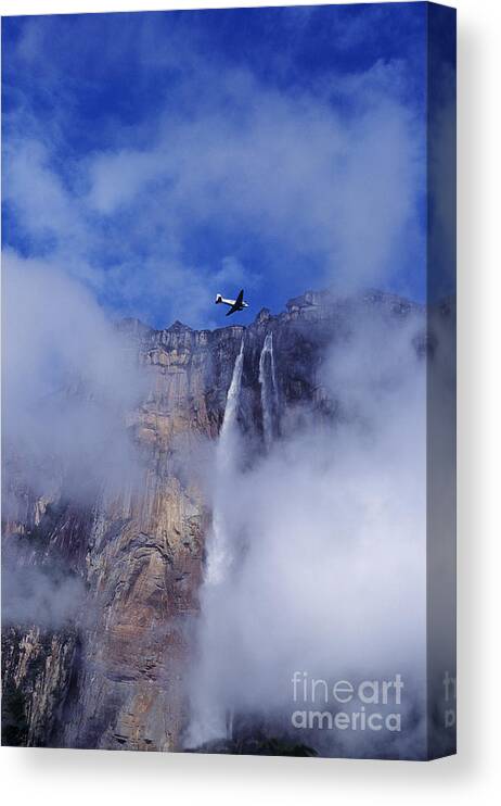Angel Falls Canvas Print featuring the photograph DC3 overflying Angel Falls Venezuela by Dave Welling