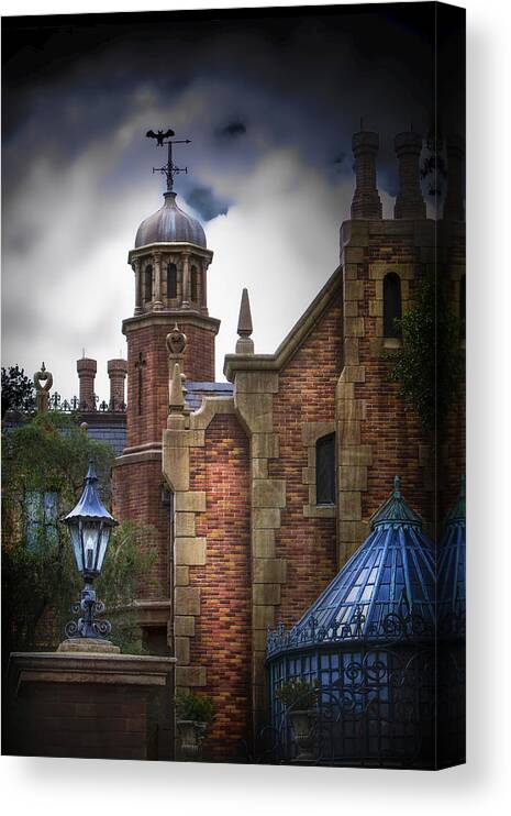 Magic Kingdom Canvas Print featuring the photograph Disney's Haunted Mansion by Mark Andrew Thomas