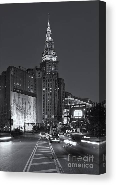 Clarence Holmes Canvas Print featuring the photograph Downtown Cleveland Morning Traffic II by Clarence Holmes