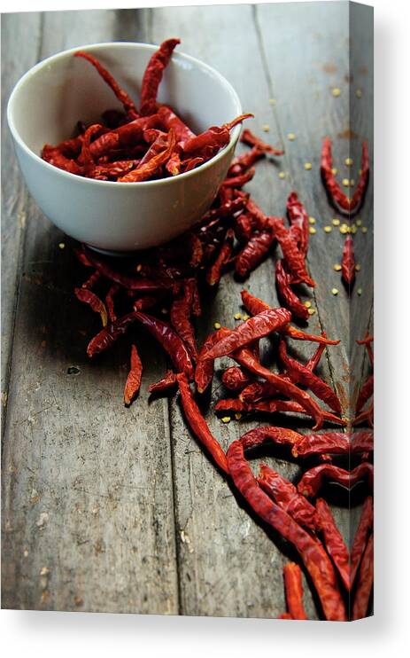Wood Canvas Print featuring the photograph Dried Chilies In White Bowl by Lina Aidukaite