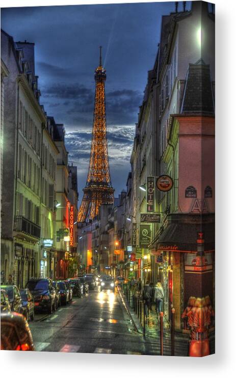 Paris Eiffel Canvas Print featuring the photograph Eiffel over Paris by Michael Kirk
