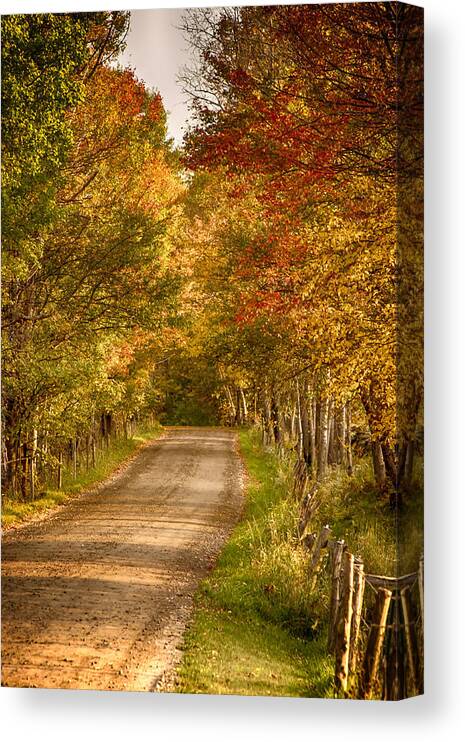 Autumn Foliage New England Canvas Print featuring the photograph Fall color along a Peacham Vermont backroad by Jeff Folger
