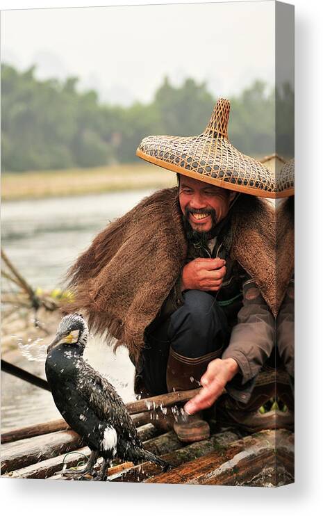 Chinese Culture Canvas Print featuring the photograph Fisherman And His Cormorant On Li River by Huang Xin