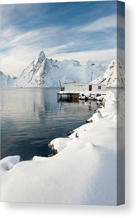 Water's Edge Canvas Print featuring the photograph Fishing Lodge In Raine, Lofoten by David Clapp
