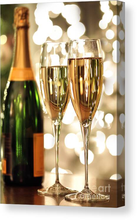 Alcohol Canvas Print featuring the photograph Glasses of champagne and bottle by Sandra Cunningham