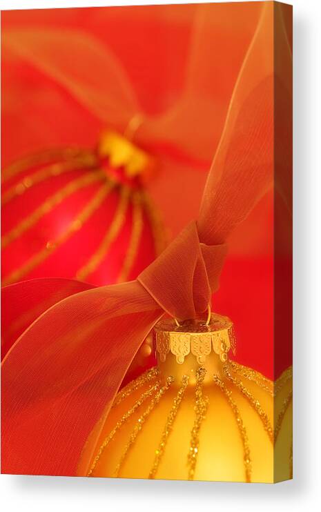Christmas Canvas Print featuring the photograph Gold and Red Ornaments with Ribbons by Carol Leigh