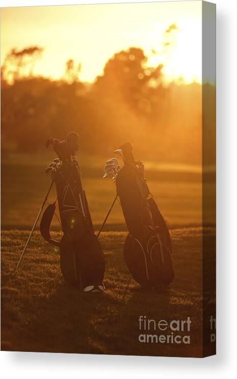 Golf Canvas Print featuring the photograph Golf bags at sunset by Diane Diederich