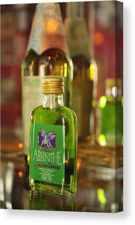 Absinthe Canvas Print featuring the photograph Green Absinthe in small bottle by Matthias Hauser
