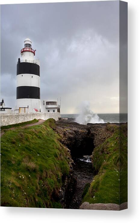 Landscape/ Lighthouse/ Waves Canvas Print featuring the photograph Hook Head Lighthouse by Ann O Connell