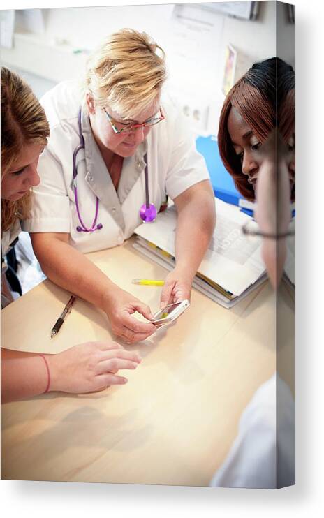 Colleagues Canvas Print featuring the photograph Hospital Nursing Meeting by Arno Massee/science Photo Library