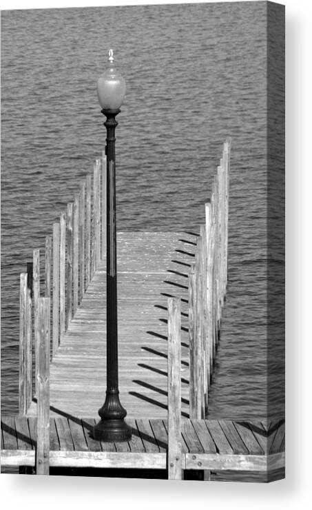 New England Canvas Print featuring the photograph Lamp and Pier by Caroline Stella