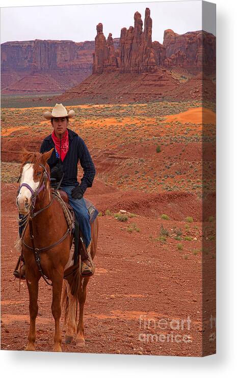 Red Soil Canvas Print featuring the photograph Lone Rider by Jim Garrison
