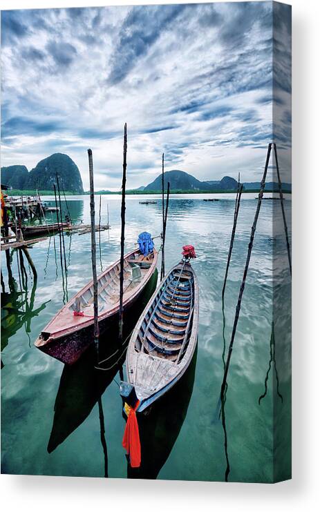 Water's Edge Canvas Print featuring the photograph Longtail Wooden Fishing Boat In Phuket by Aleksandargeorgiev
