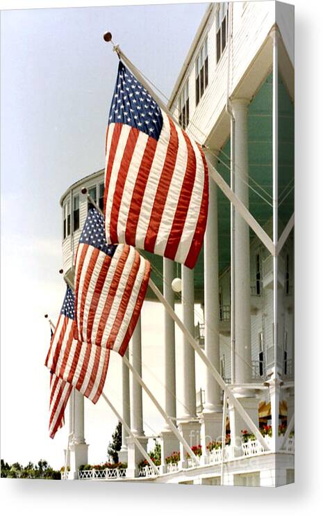American Flag Canvas Print featuring the photograph Mackinac Island Michigan - The Grand Hotel - American Flags by Kathy Fornal