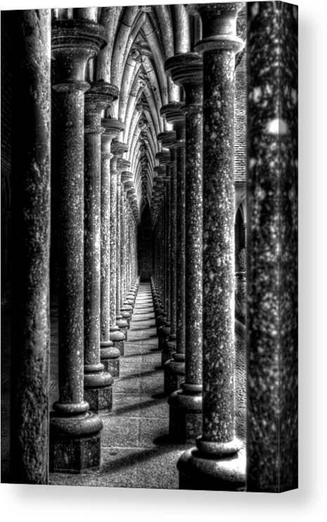 Mont St Michel Canvas Print featuring the photograph Mont St Michel Pillars by Nigel R Bell