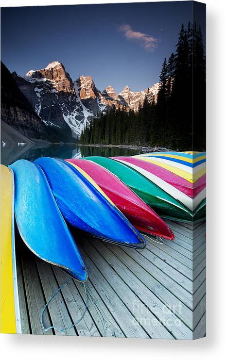 Photography Canvas Print featuring the photograph Moraine lake canoes by Ivy Ho