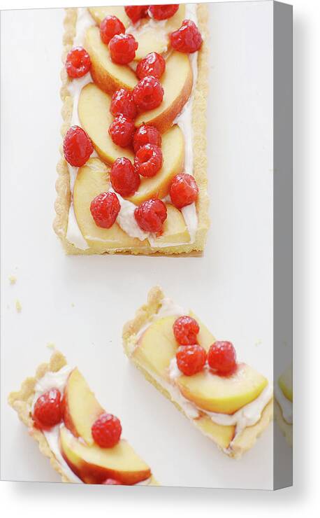 White Background Canvas Print featuring the photograph Nectarine And Raspberry Tart by Lucytxcicipeng