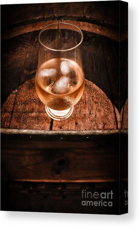 Beverages Canvas Print featuring the photograph Old barrel top glass of hard liquor by Jorgo Photography