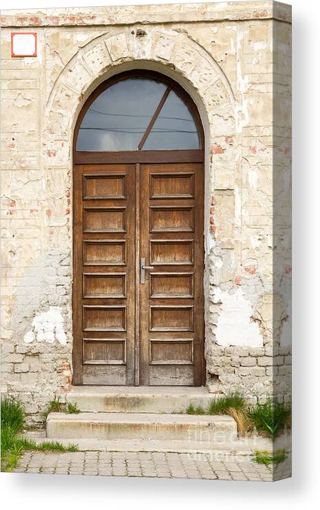 Old Canvas Print featuring the photograph Old church door by Les Palenik