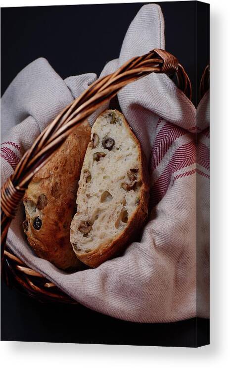 Black Background Canvas Print featuring the photograph Olive Bread by Lucytxcicipeng