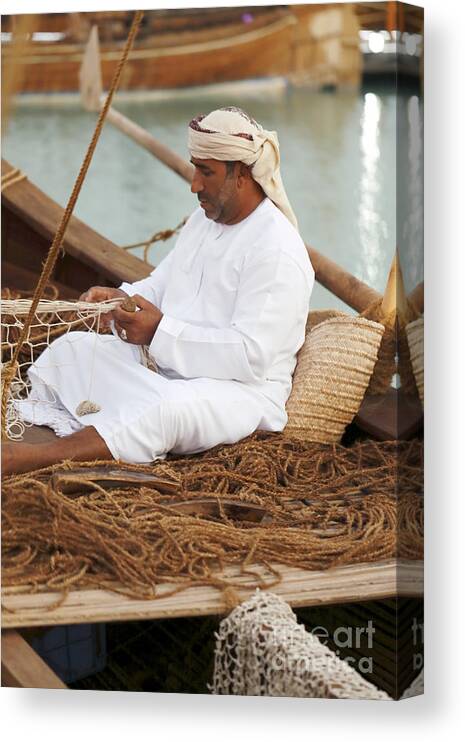 Doha Canvas Print featuring the photograph Omani net-making demonstration by Paul Cowan
